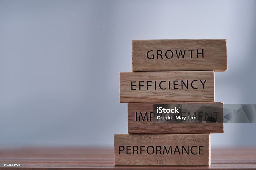 Business management related words growth, efficiency,improvement and performance on wooden blocks Education Training Class Stock Photo Business management related words growth, efficiency,improvement and performance on wooden blocks Education Training Class Stock Photo