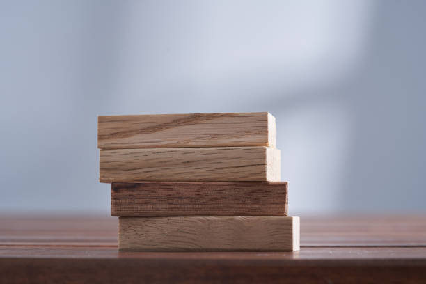 istock Wooden blocks on gray background 1422563928