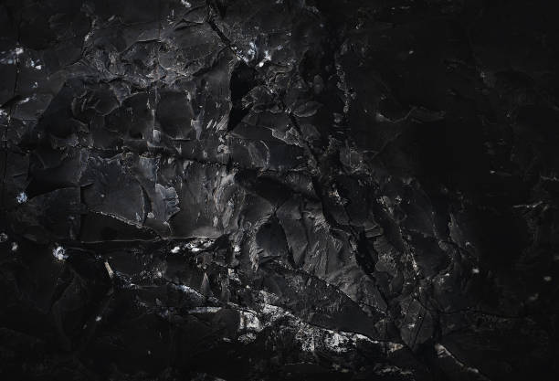 istock Dark marble. Black texture. Stone background. Rock texture. Rock surface with cracks. Rock pile. Paint spots wall. Grunge Rough structure. Abstract texture. 1422564034