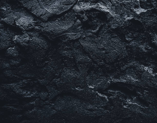 istock Rock surface with cracks. Black texture. Stone background. Dark marble. Rock texture. Rock pile. Paint spots wall. Grunge Rough structure. Abstract texture. 1422564439
