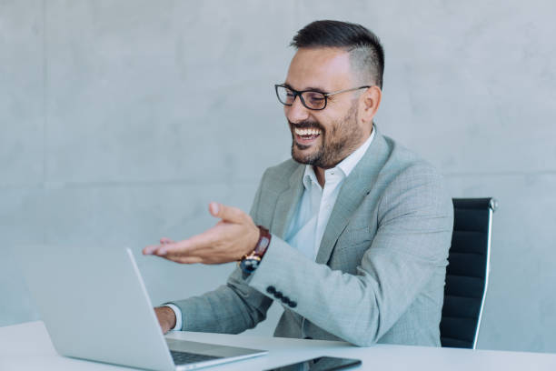 istock Businessman having video call in the office. 1422565495