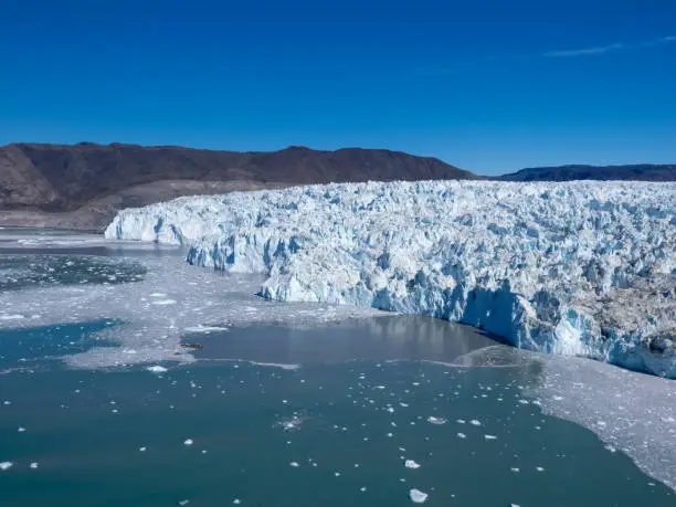 Photo of The stunning Eqi Glacier (Eqip Sermia), a rapidly retreating outlet glacier, north of the disko Bay in Western Greenland