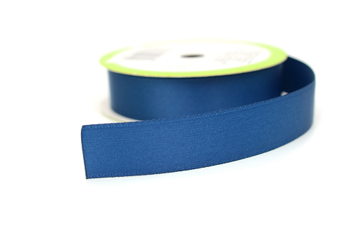 Red and blue adhesive tape in stack are isolated on white background with clipping path.