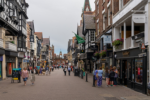 Chester, United Kingdom - 26 August, 2022: view of the historic city center of Chester with many people out and about in the busy High Street