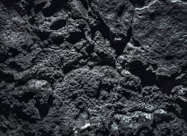 istock Rock surface with cracks. Grunge Rough structure. Silver Wall. Rock background. Rock texture. Black texture. Dark marble. Stone background. Rock pile. Paint spots. Abstract texture. 1422582114