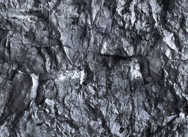 istock Silver Wall. Rock background. Rock texture. Black texture. Dark marble. Stone background. Rock pile. Paint spots. Rock surface with cracks. Grunge Rough structure. Abstract texture. 1422582499