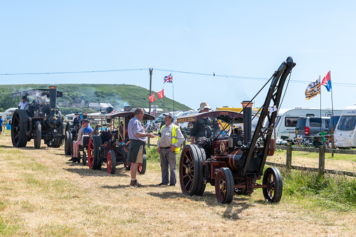 West Bay.Dorset.United Kingdom.June 12th 2022.A selection of restored traction engines are being driven at the West Bay vintage rally