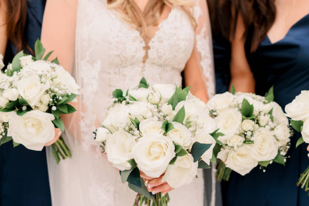 istock Bride and Bridesmaids with Wedding Bouquets 1422593766
