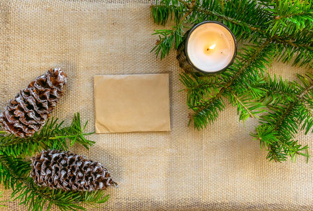 istock Christmas composition with cones, fir cones and a candle 1422600367
