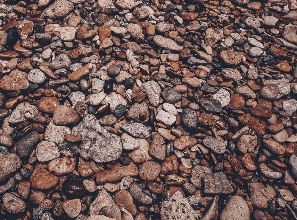 istock Brick brown. Rock pile. Rock background. Rock texture. Stone background. Paint spots. Rock surface with cracks. Grunge Rough structure. Abstract texture. 1422600586