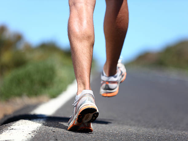 istock Running sport shoes on runner 142260065