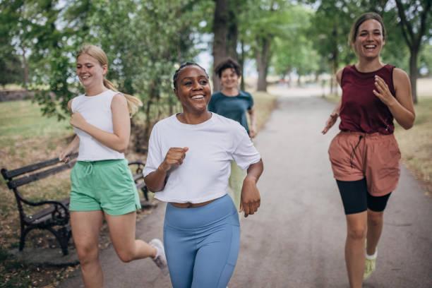 istock Women jogging together 1422607249