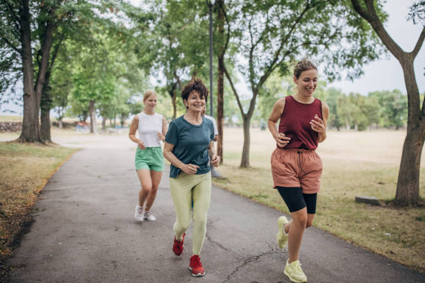 istock Friends jogging in park 1422607592