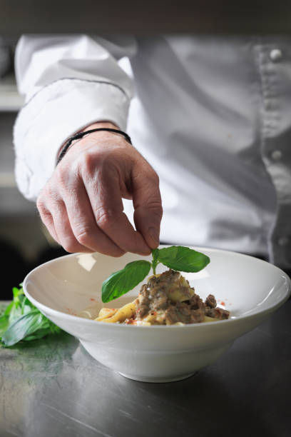 istock Cream Tagliatelle pasta prepare and serve 1422610252