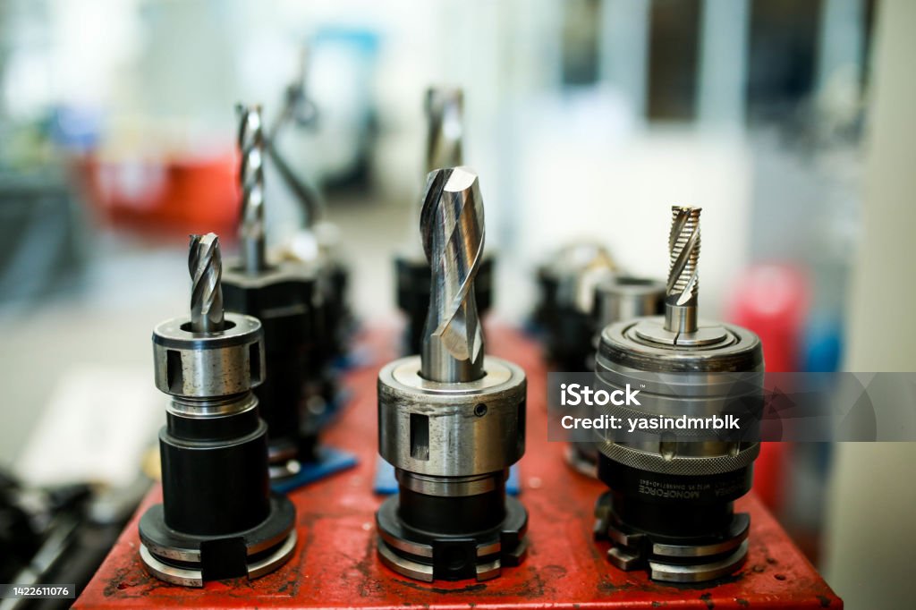 cutting tools used in cnc milling machine.  end mills attached in tool holder Accuracy Stock Photo