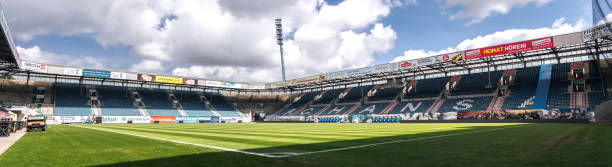 Wide panorama of Ostseestadion, Rostock, Germany Rostock, Mecklenburg-Vorpommern, Germany - May 2022: Panoramic wide view inside Ostseestadion, home stadium of FC Hansa Rostock hansa rostock photos stock pictures, royalty-free photos & images