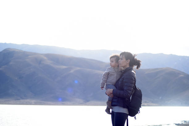 istock mother with son on the riverbank 1422631174