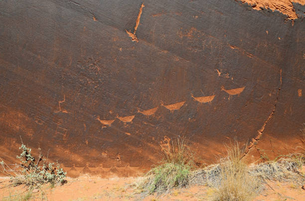 Petroglyphs in Colorado River canyon stock photo