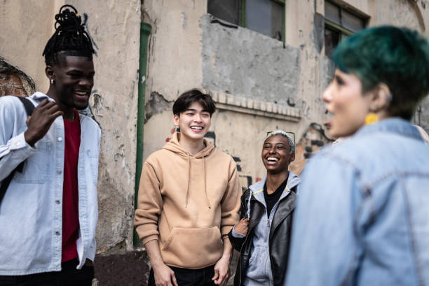 istock Friends talking in the street 1422641630
