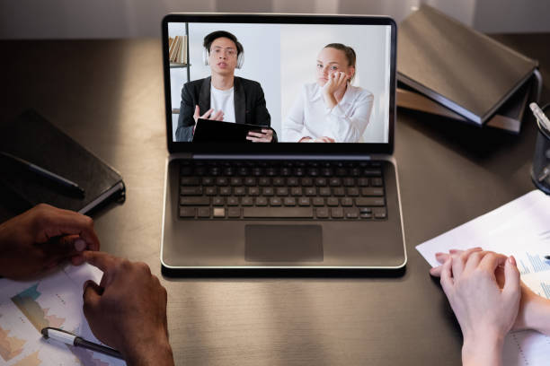istock video interview remote meeting colleagues laptop 1422642065