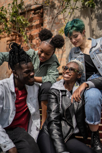 istock Friends talking in the street 1422643666