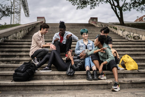 istock Friends talking in the street 1422643888