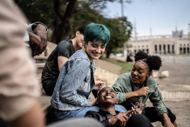 istock Friends talking in the street 1422643938