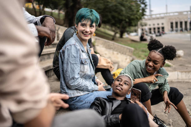 istock Friends talking in the street 1422643944