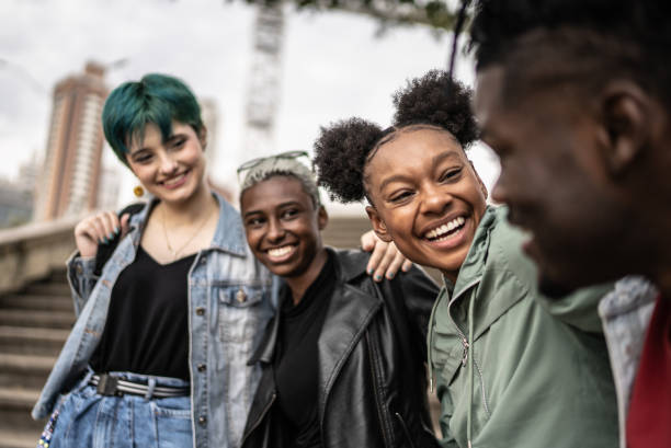 istock Friends talking in the street 1422643970