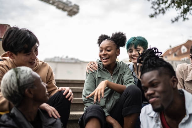istock Friends talking in the street 1422644144