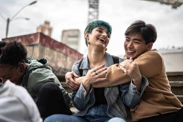 istock Friends talking in the street 1422644194