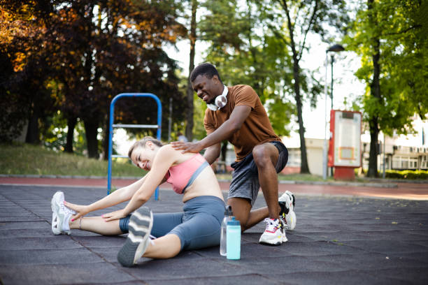 istock Sporty couple doing exercises 1422644513