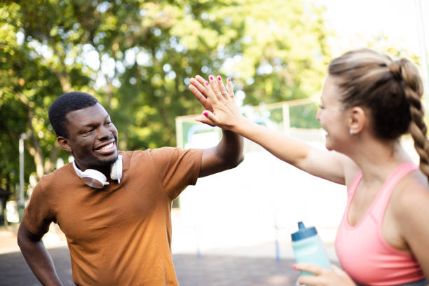 istock Sporty couple doing exercises 1422644530
