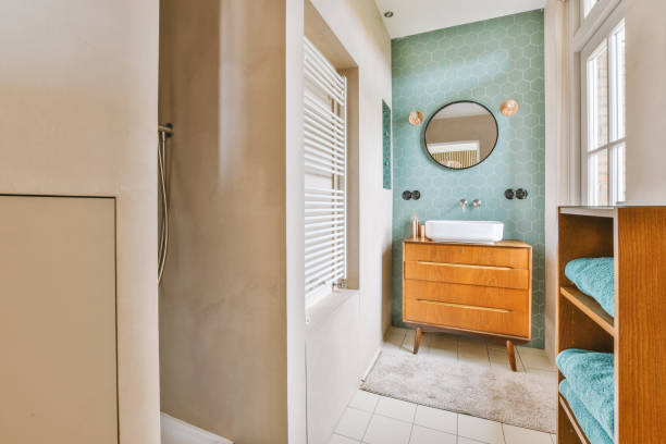 istock Modern bathroom with a sink and towels 1422646564
