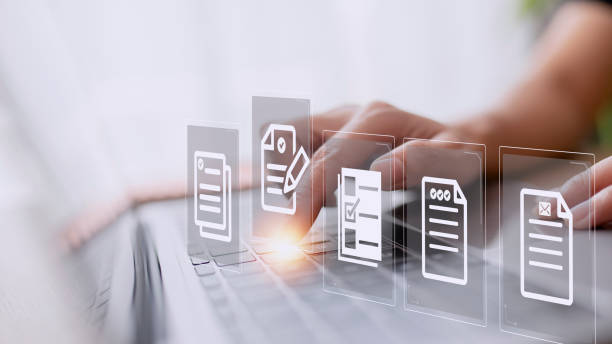 istock Concept of document management using symbols on a virtual screen, ERP 1422657624