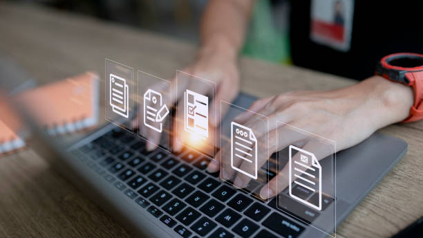 istock Concept of document management using symbols on a virtual screen, ERP 1422657627