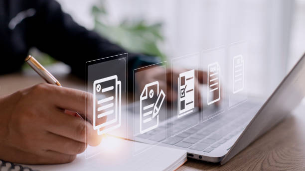 istock Paperless workplace ideas, e-signing, electronic signature, document management. A businessman signs an electronic document on a digital document on a virtual screen. 1422657634