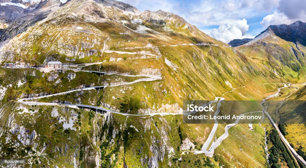 Road to Furka Pass in Switzerland Zig-zag road to Furka Pass in the Swiss Alps Adventure Stock Photo