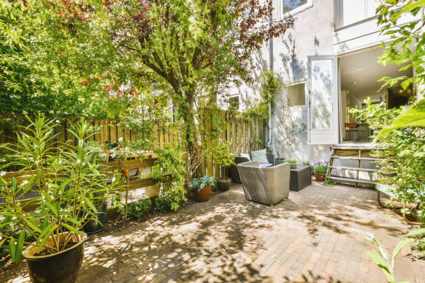 istock A spacious courtyard behind a residential building with a relaxation area 1422659139