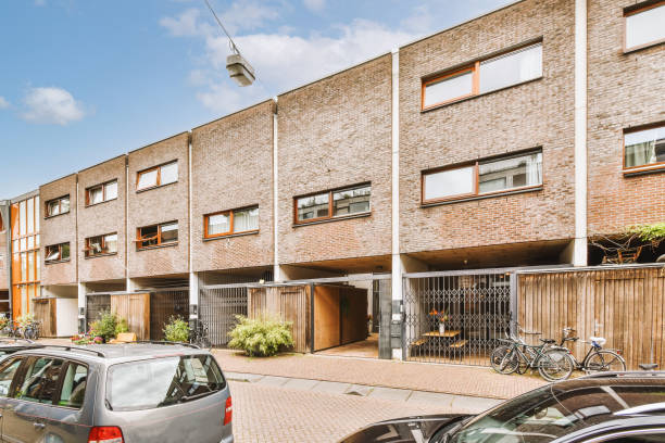 istock Brick house with parking spaces 1422664725