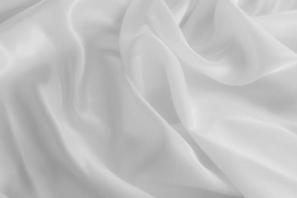 istock White cloth background abstract with soft waves, closeup texture of cloth 1422665255