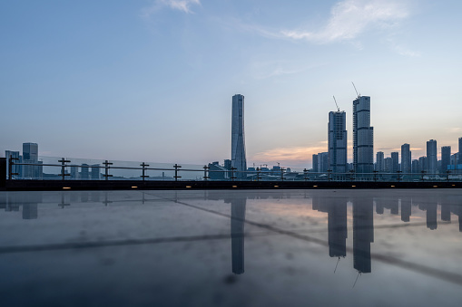 Open square in front of modern city