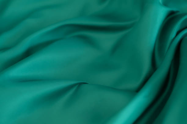 istock green fabric texture background, abstract, closeup texture of cloth 1422666068