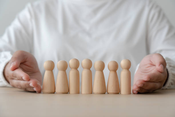 istock Group of people in wooden figures faceless human 1422669062