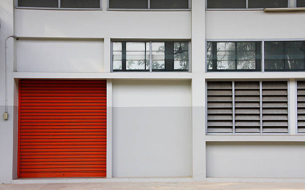istock orange door on the white wall 142267202