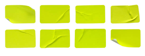 istock A set of fluorescent neon yellow rectangular paper sticker label isolated on white background. 1422672368