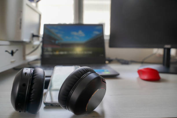 istock Working from home and remote access concept. Office at home with personal computer and equipment for online communications. 1422673705