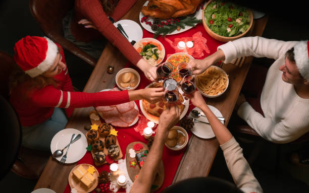 istock Family dining at christmas table. 1422678559