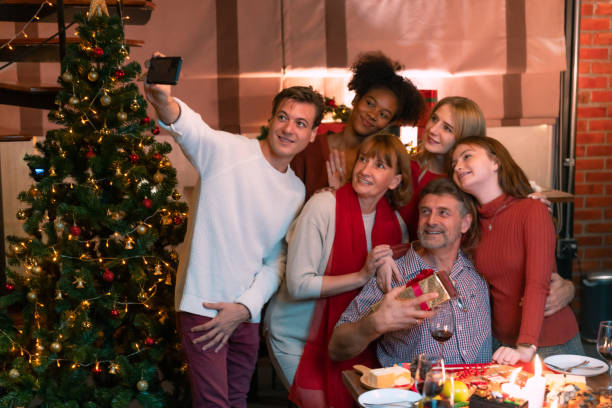 istock Family celebrating christmas at home. 1422678908