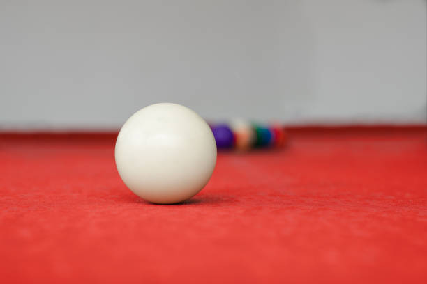 istock White snooker ball on red snooker table 1422684444